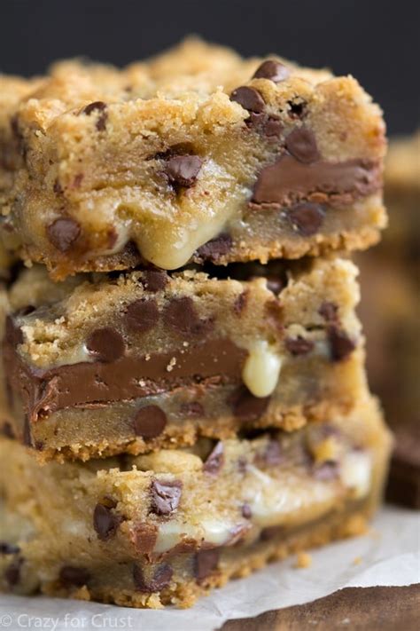 Sprinkle the chips, coconut, and nuts on top. . Bars made with cake mix and sweetened condensed milk